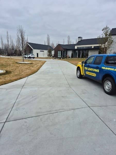A Lawn Dogs technician on a route in Eagle, Idaho