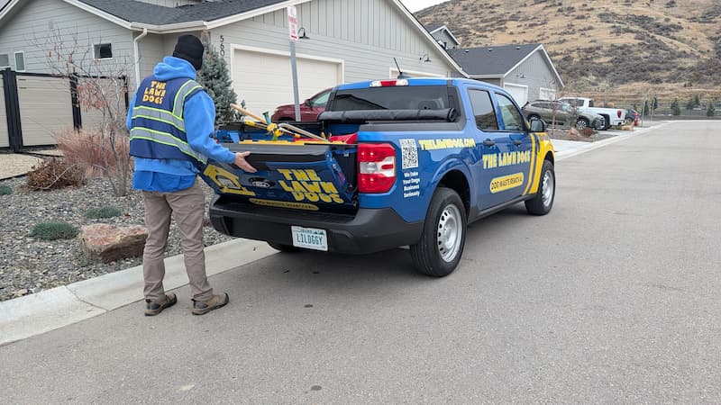 The Lawn Dogs fleet trucks lined up at the tailgate, Treasure Valley Idaho